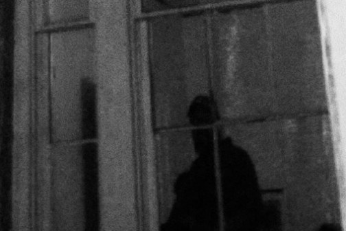 a black sign with white letters