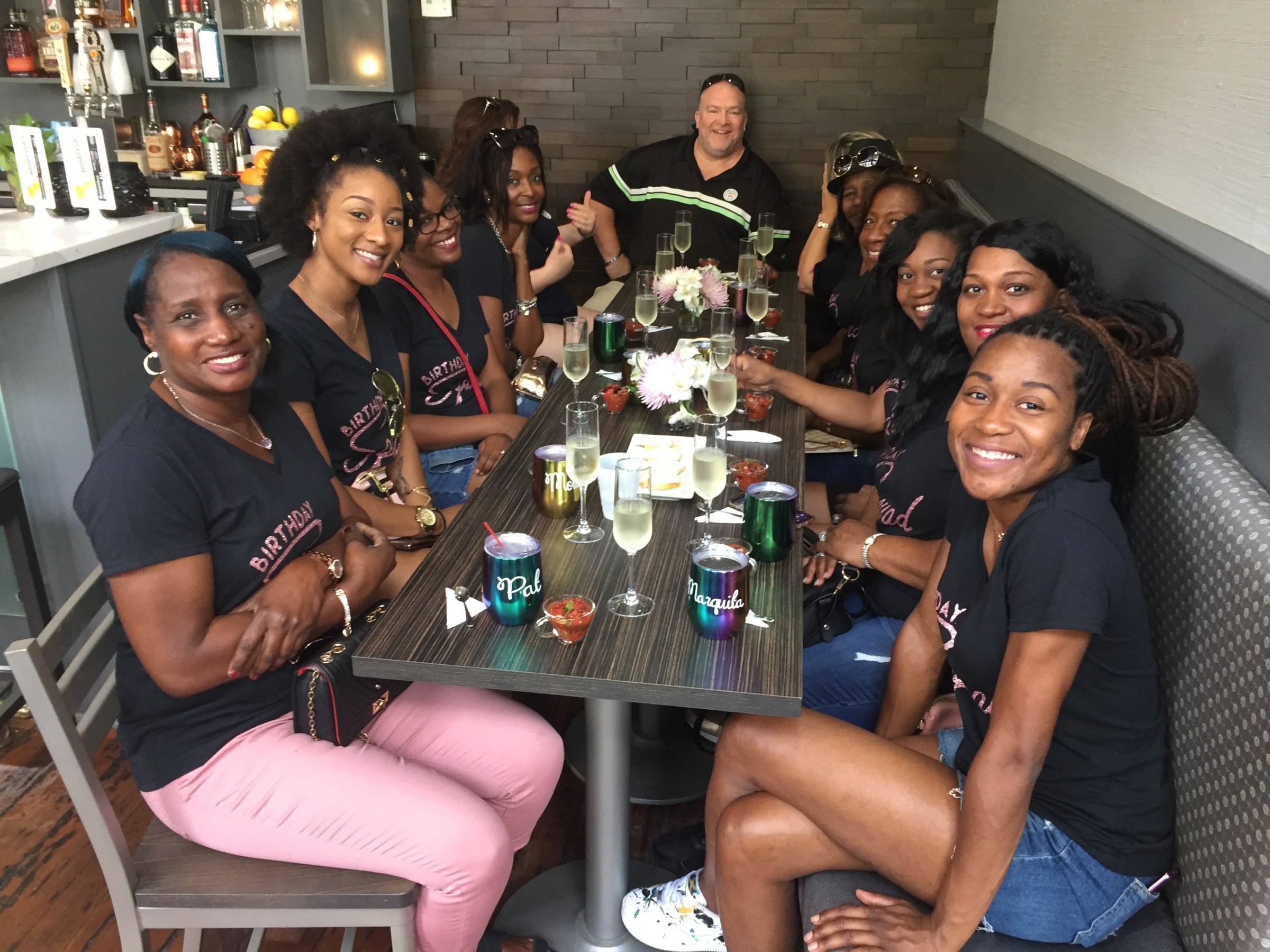 a group of people posing for the camera