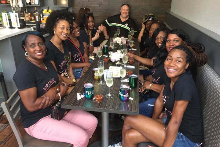 a group of people posing for the camera