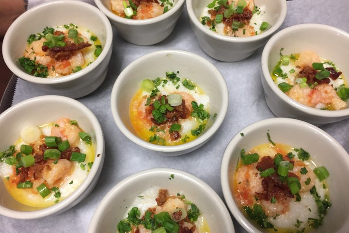 a bowl filled with different types of food on a table