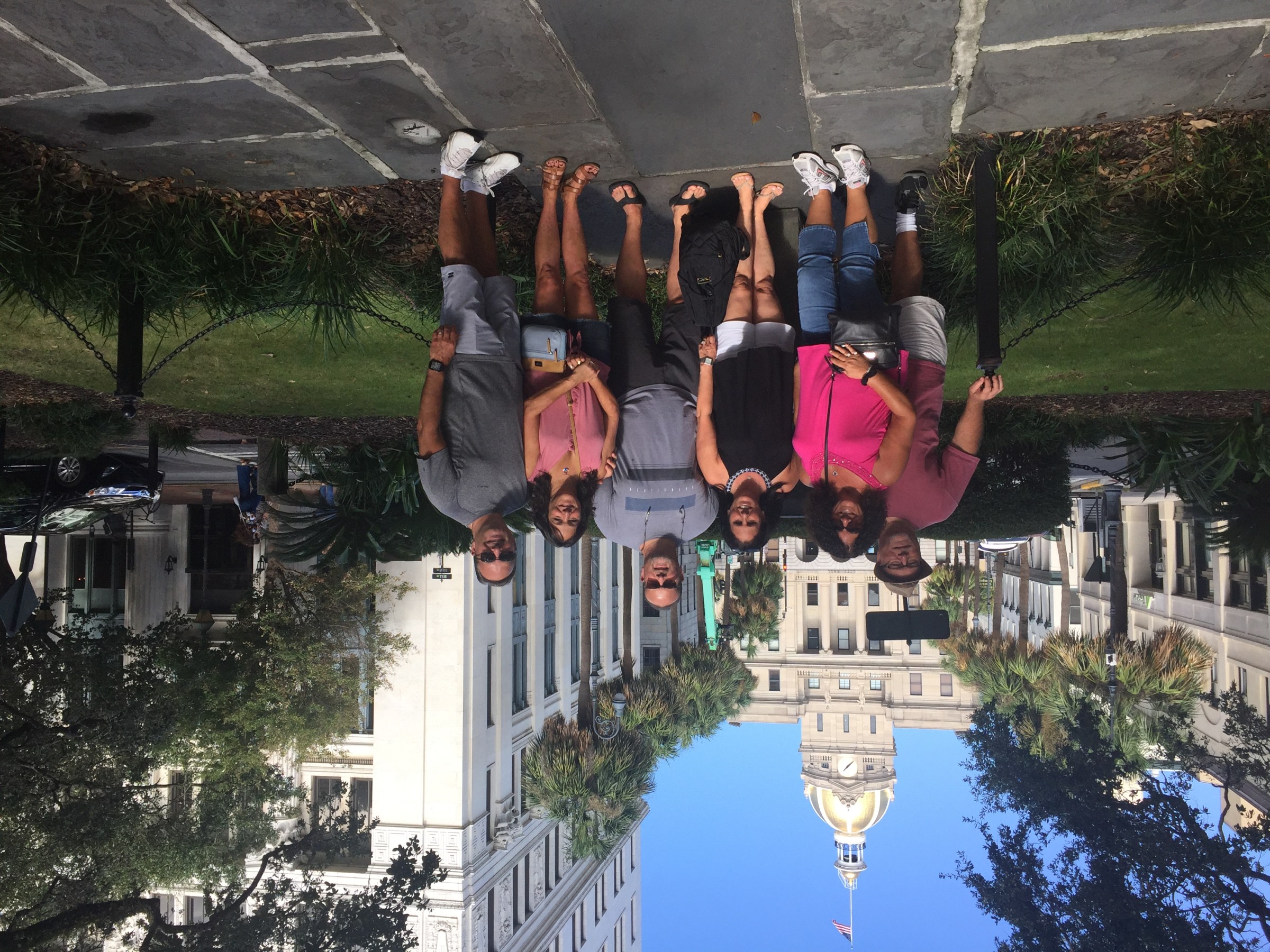 a group of people walking down a street