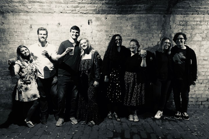 a group of people posing for a photo