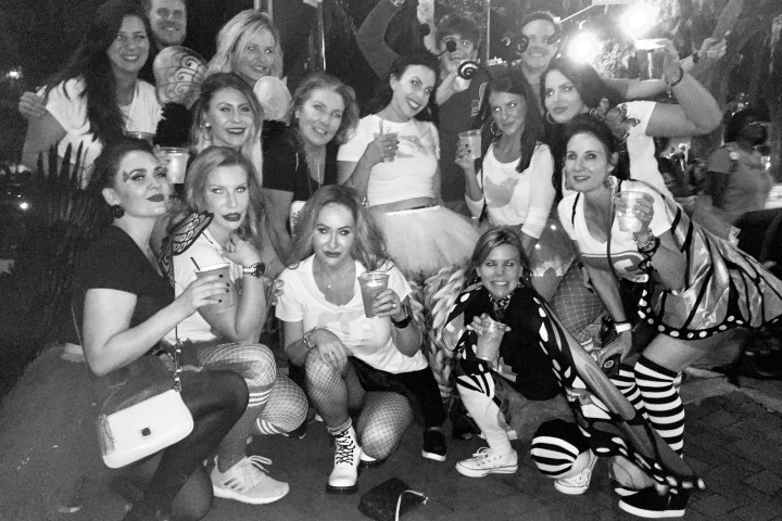 a group of people posing for a photo