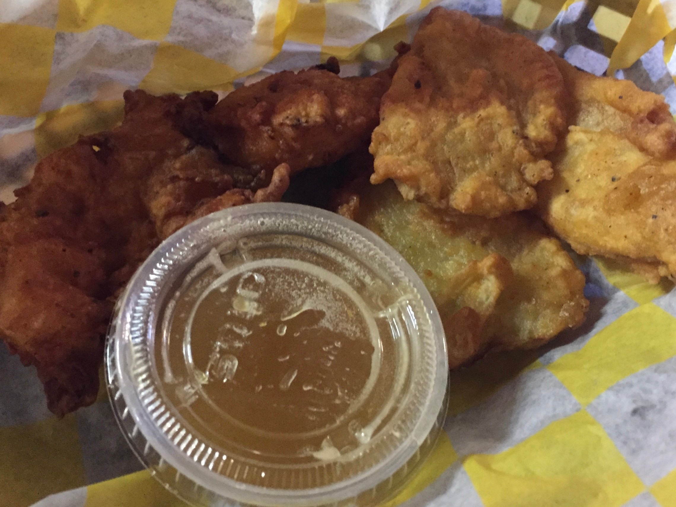 a plate of food and a cup of coffee