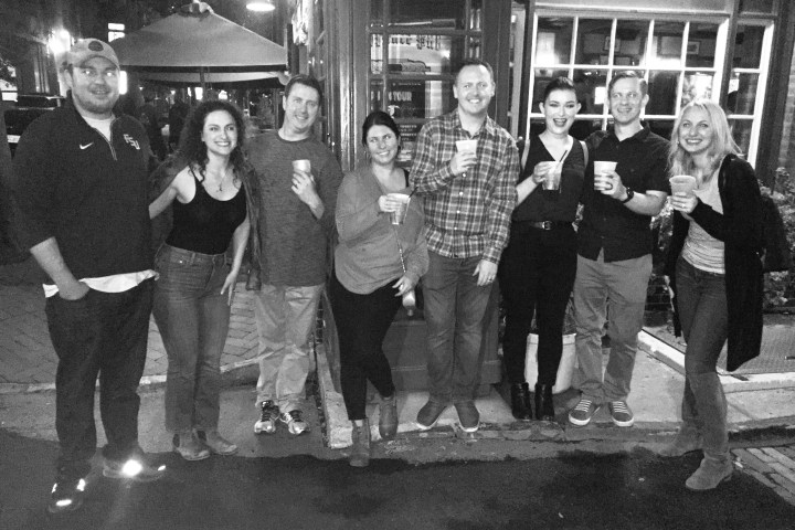 a group of people posing for a photo