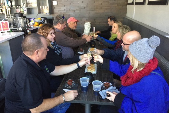 a group of people sitting at a table