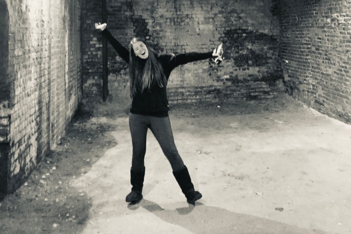 a person walking down a dirt road