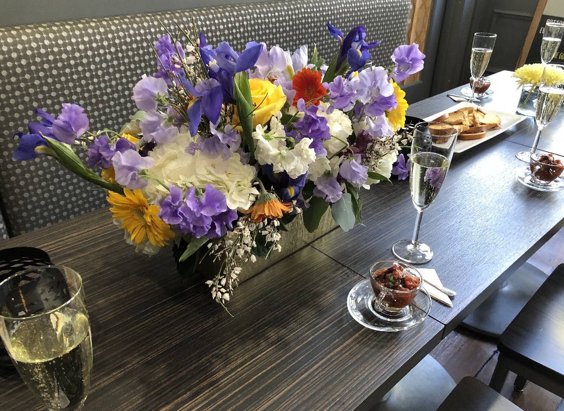 a vase of flowers on a table