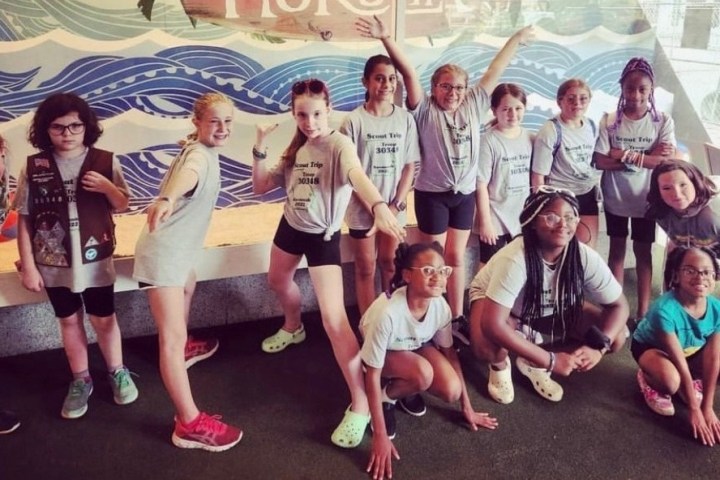 a group of people posing for a photo